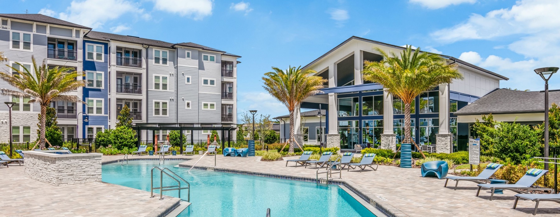 Pool Deck and Clubhouse + Building Exterior