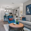Unit Interior with Modern Furniture and Wood Flooring at Integra Park at Oakleaf
